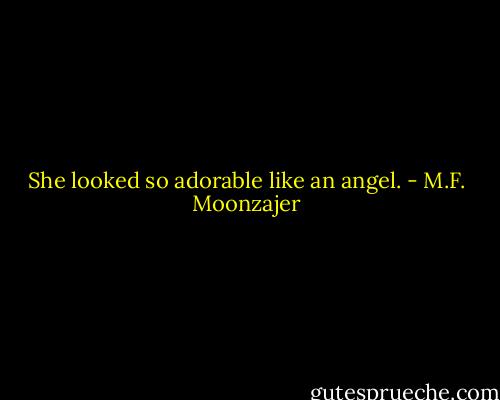 She looked so adorable like an angel. - M.F. Moonzajer